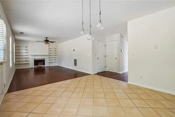 a bedroom with a bed and a fireplace