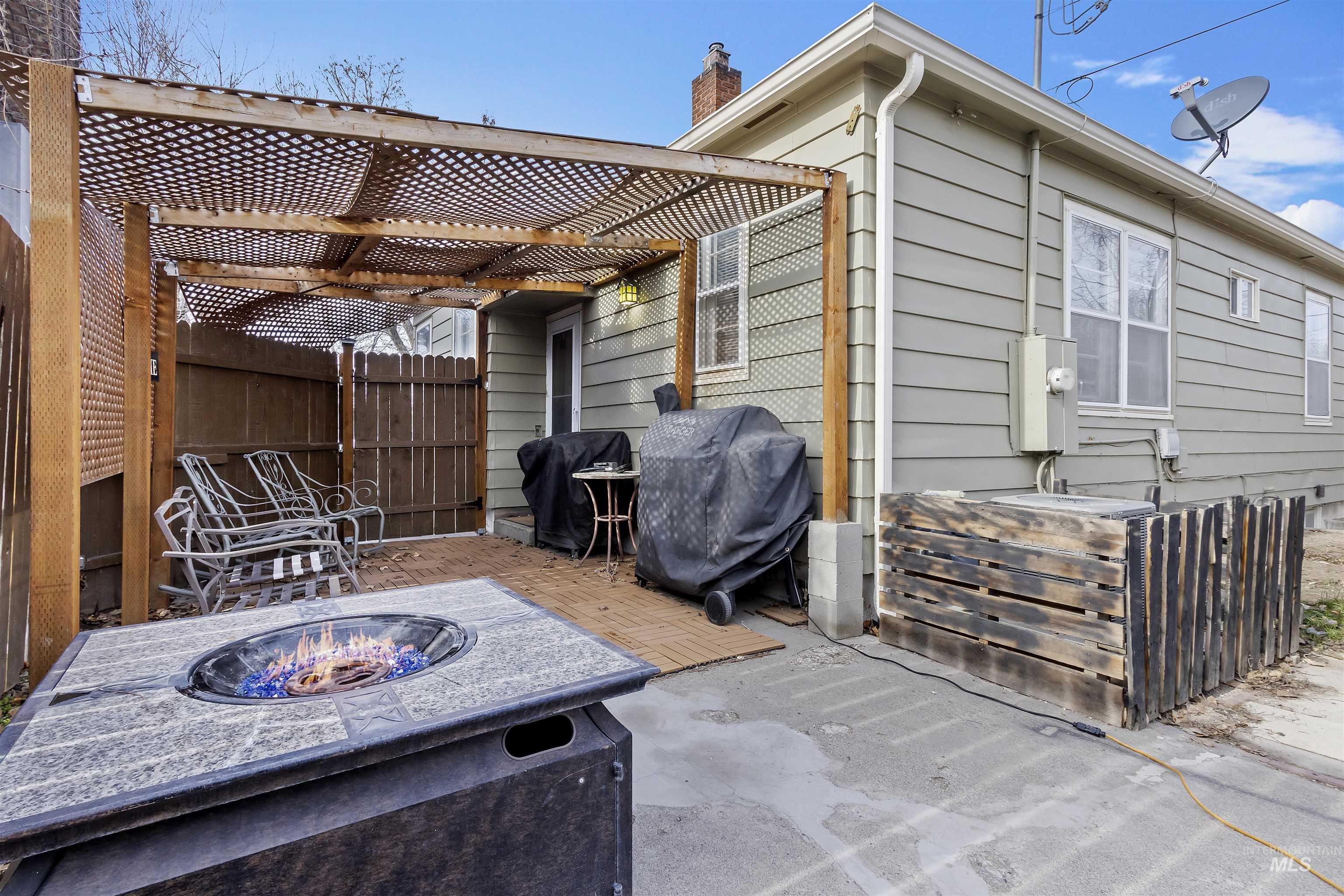 184 Taylor Street Twin Falls, ID 83301 - Photo 19 of 23 View of patio / terrace featuring area for grilling and a fire pit