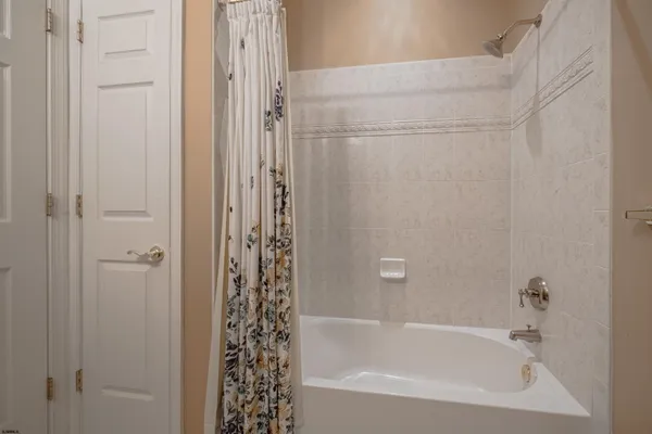 a bathroom with a bathtub
