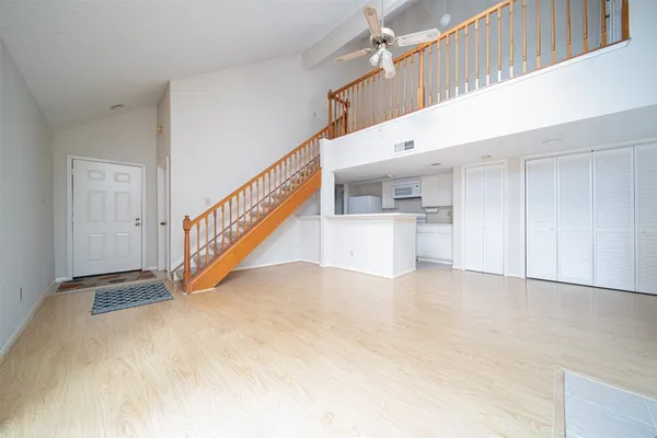 a view of a hallway with staircase
