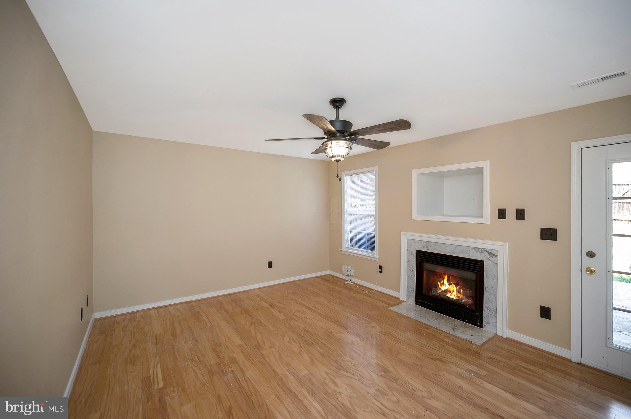 303 Donelson Loop Stafford, VA 22554 - Photo 9 of 50 Family room with fireplace