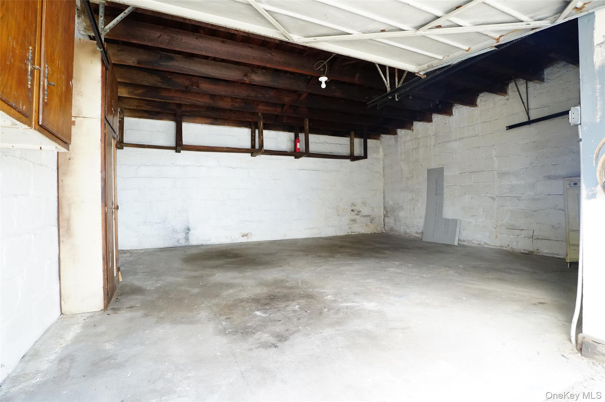 160-11 84th Road Queens, NY 11432 - Photo 24 of 25 Two-car garage