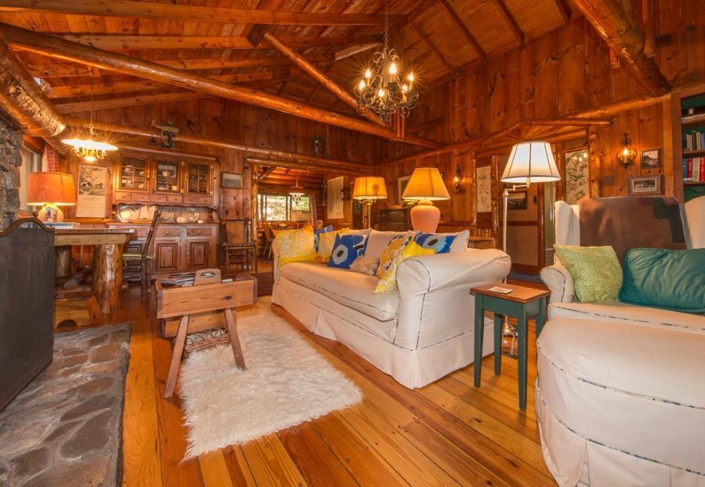 97 Appalachee Road Boothbay Harbor, ME 04538 - Photo 7 of 19 The living room, with large stone...