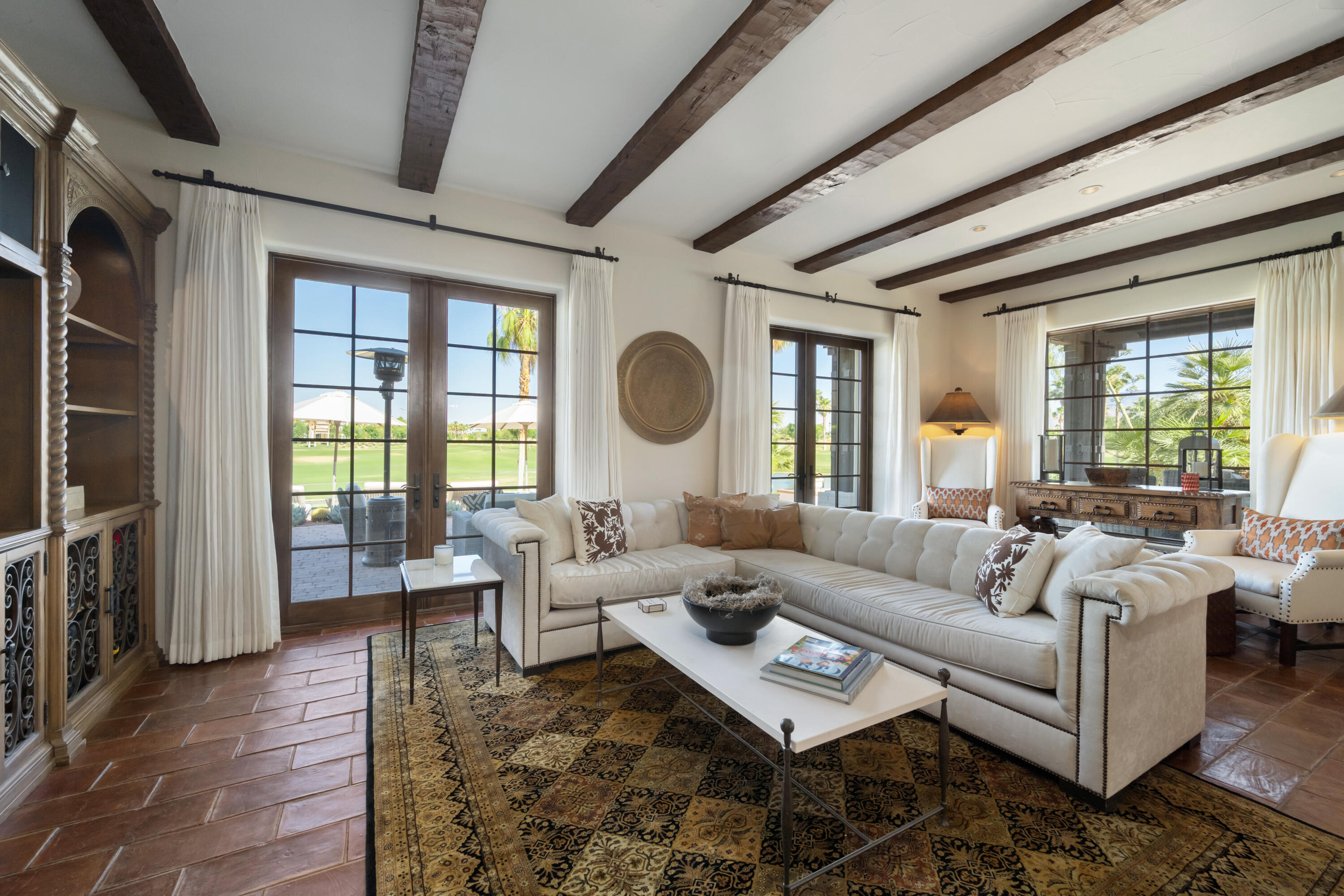 53760 Via Palacio La Quinta, CA 92253 - Photo 11 of 55 a living room with furniture and a large window