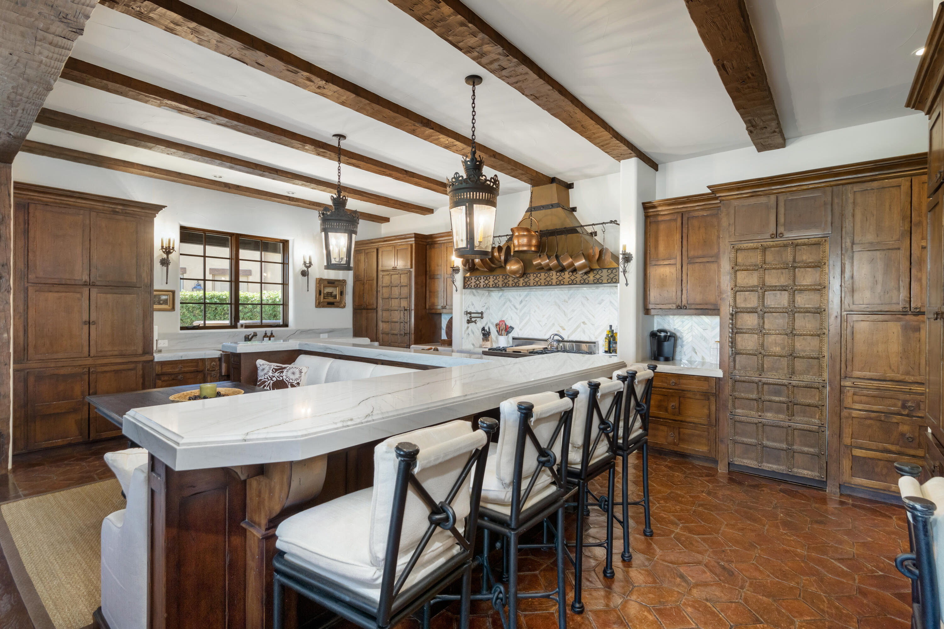 53760 Via Palacio La Quinta, CA 92253 - Photo 16 of 55 a dining table with chairs and window