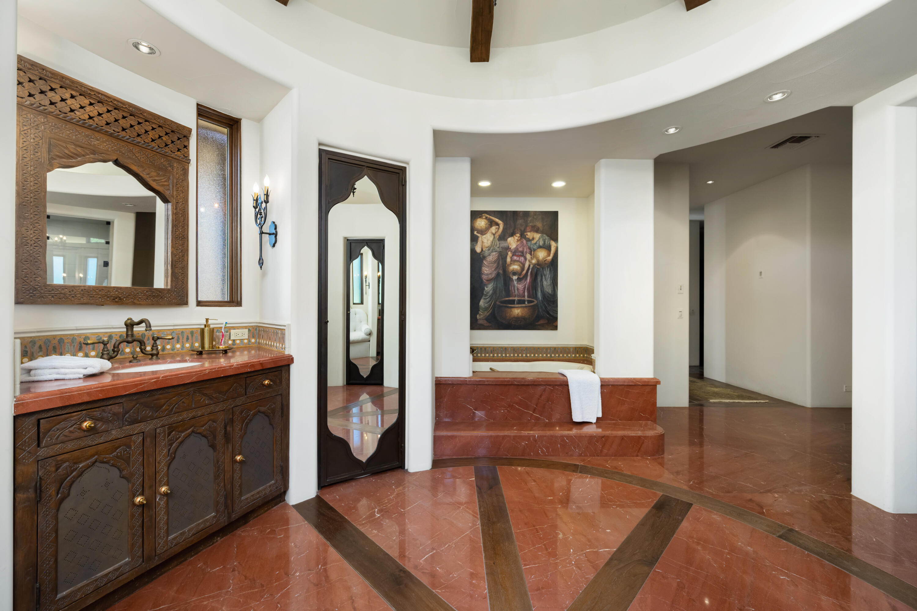 53760 Via Palacio La Quinta, CA 92253 - Photo 25 of 55 a spacious bathroom with a tub sink and mirror