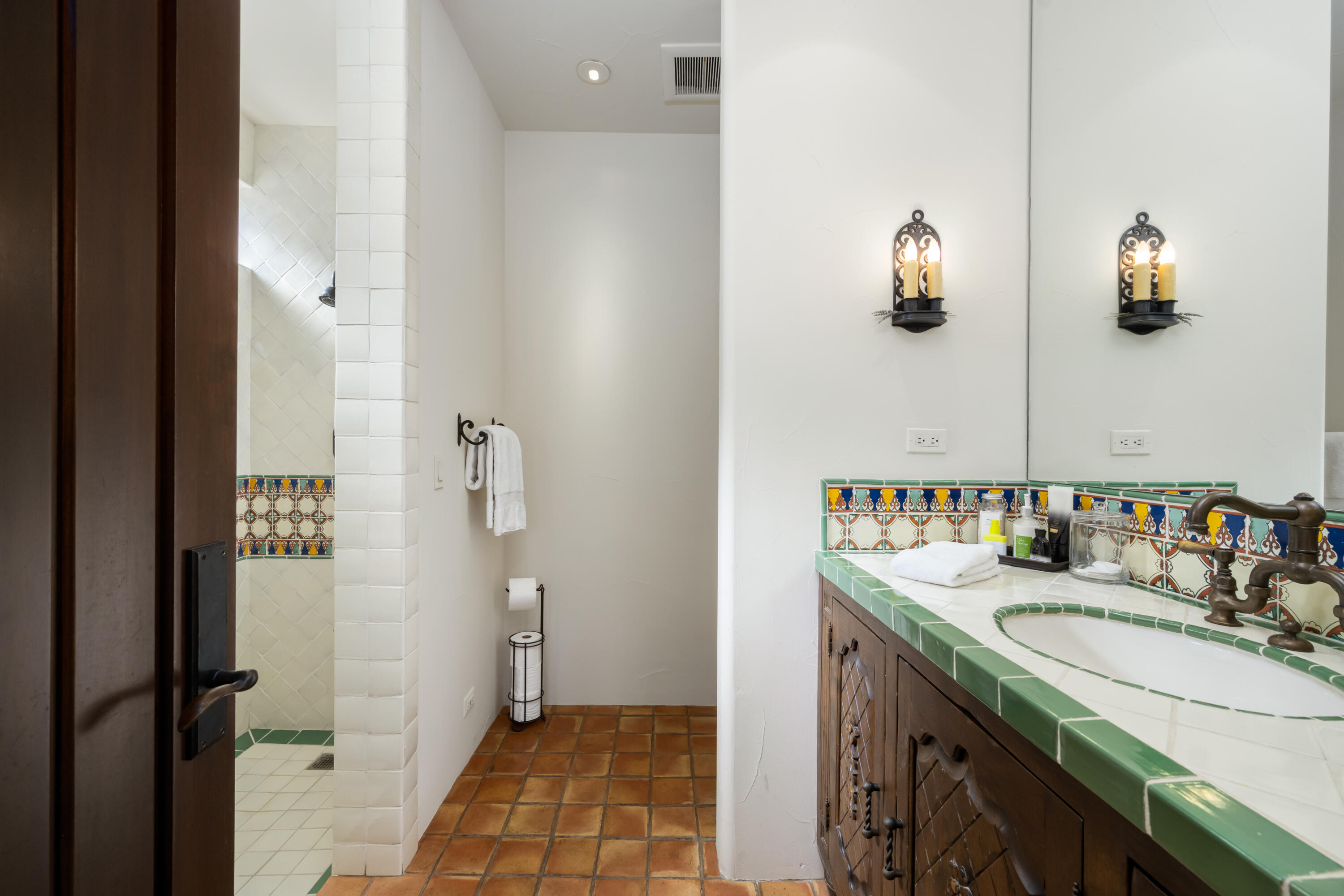53760 Via Palacio La Quinta, CA 92253 - Photo 29 of 55 a bathroom with a sink and mirror