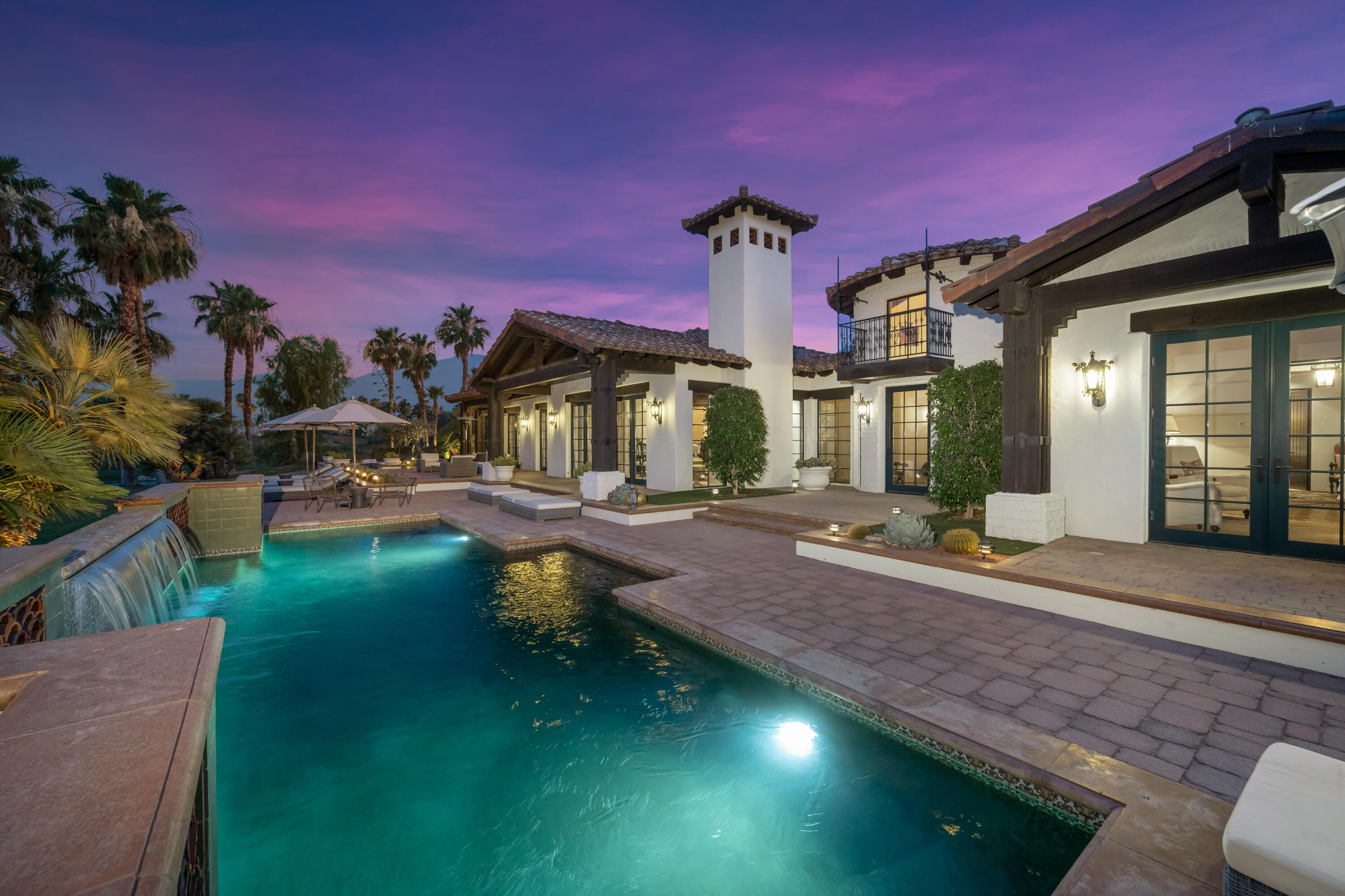 53760 Via Palacio La Quinta, CA 92253 - Photo 3 of 55 a front view of a house with garden