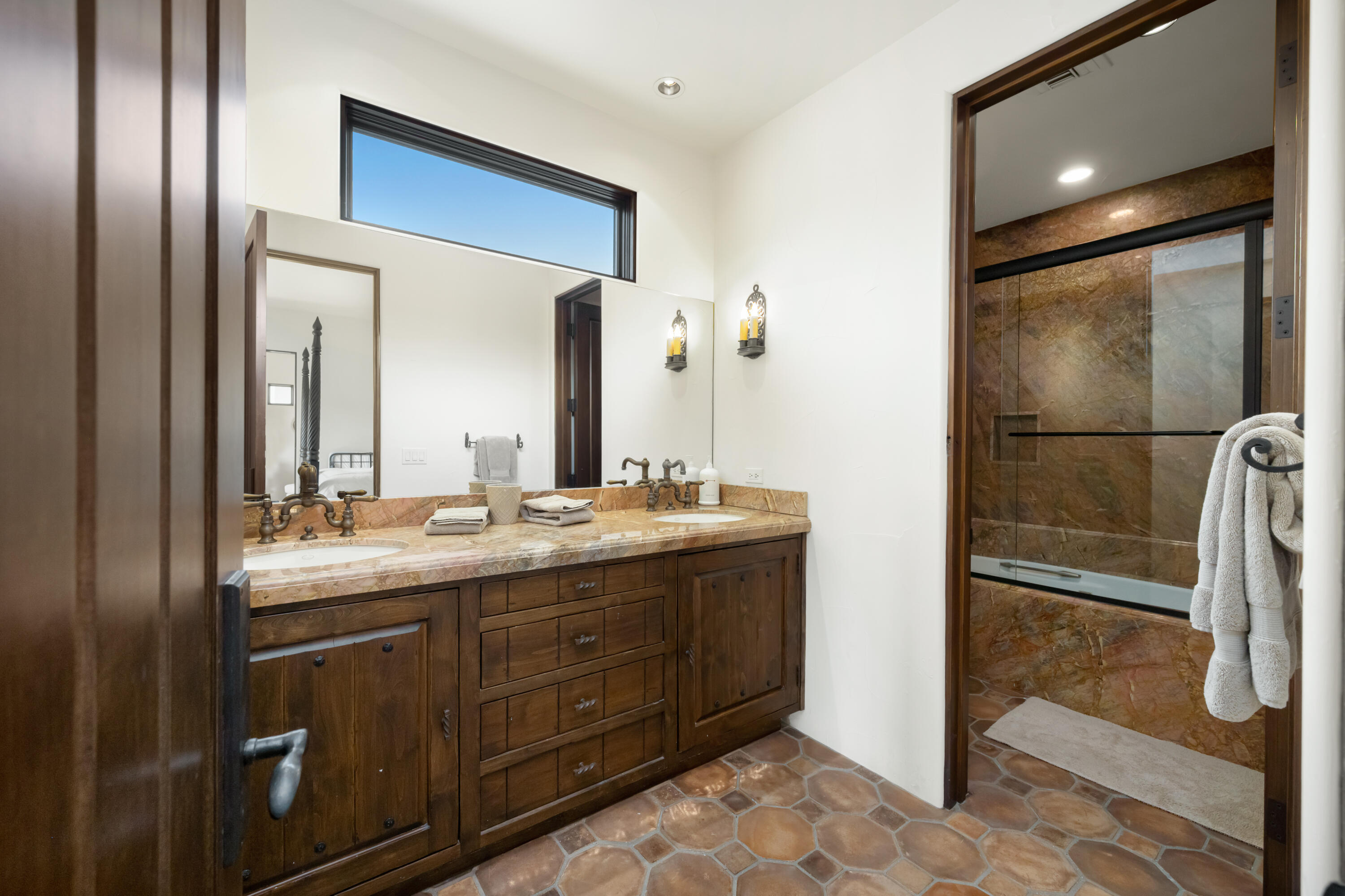 53760 Via Palacio La Quinta, CA 92253 - Photo 34 of 55 a bathroom with a double vanity sink and a mirror
