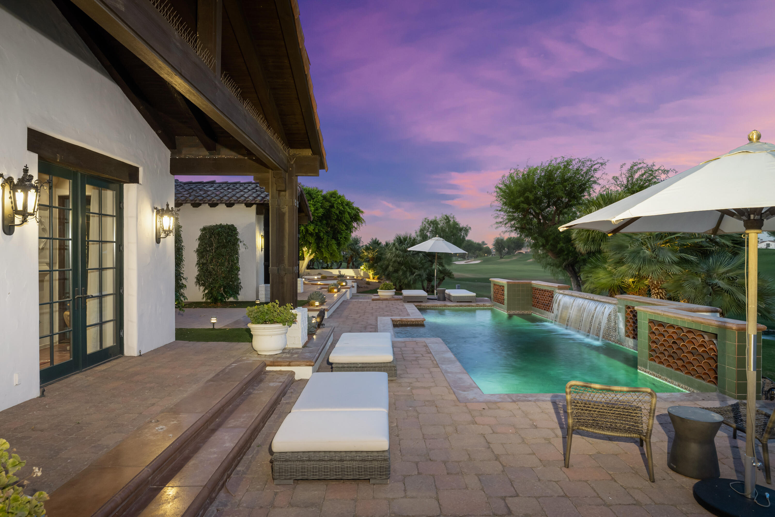 53760 Via Palacio La Quinta, CA 92253 - Photo 39 of 55 a view of a patio with swimming pool and furniture