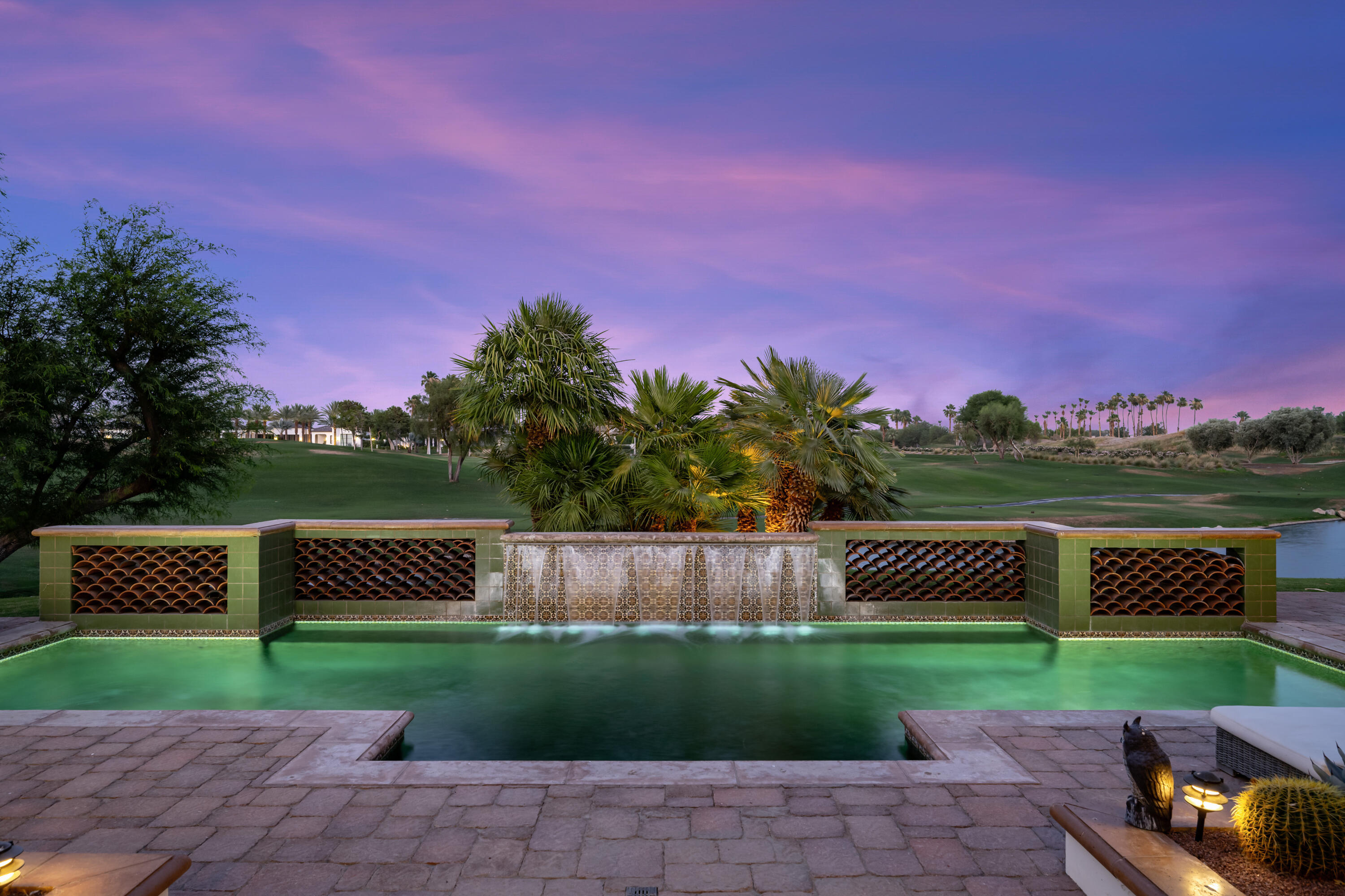 53760 Via Palacio La Quinta, CA 92253 - Photo 42 of 55 a view of a street with a big yard and a large tree