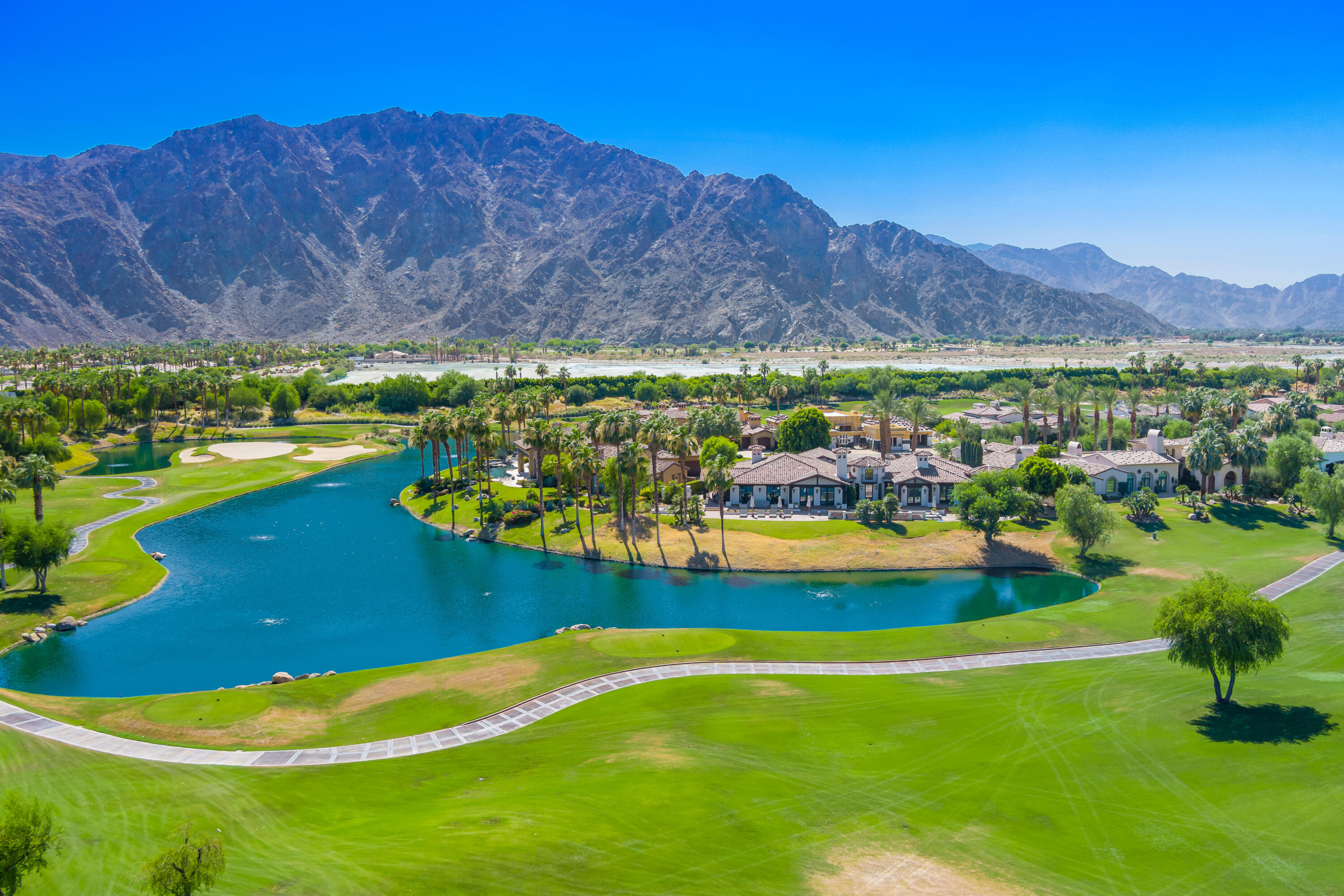 53760 Via Palacio La Quinta, CA 92253 - Photo 54 of 55 a view of a swimming pool with a yard