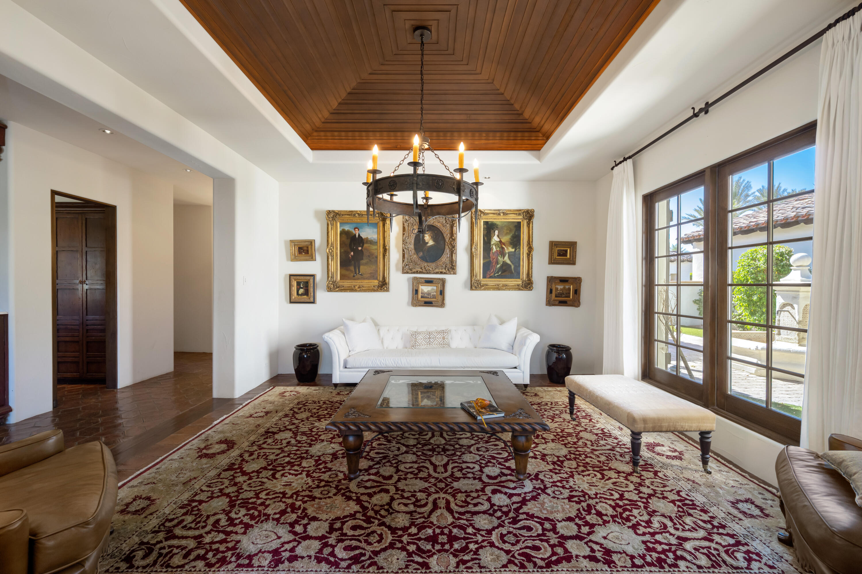 53760 Via Palacio La Quinta, CA 92253 - Photo 9 of 55 a living room with furniture a dining table and a chandelier