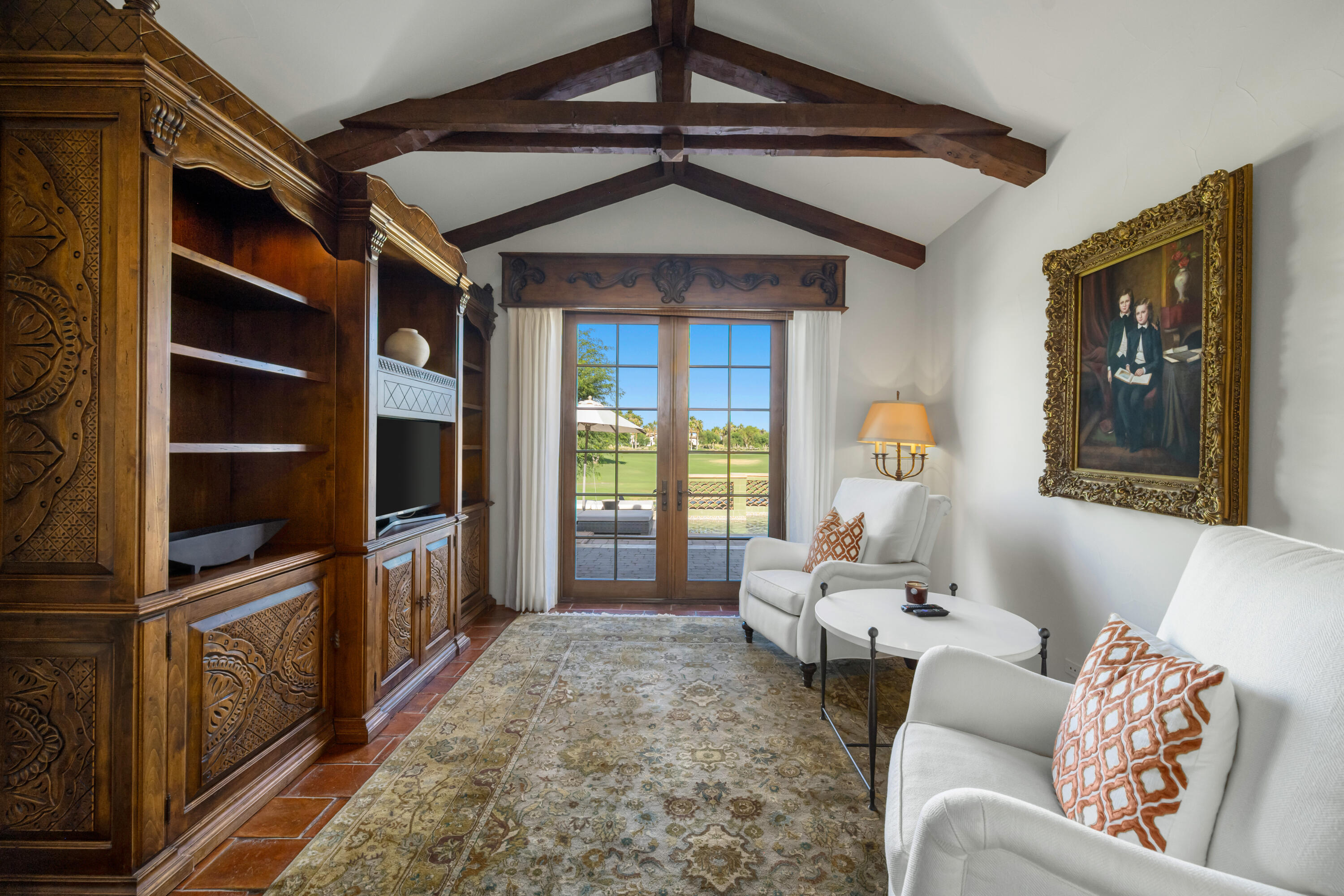 53760 Via Palacio La Quinta, CA 92253 - Photo 10 of 55 a living room with furniture and a flat screen tv