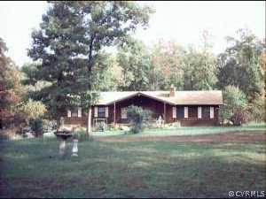 155 Swann Road Cumberland, VA 23040 - Photo 1 of 1 a front view of a house with a yard