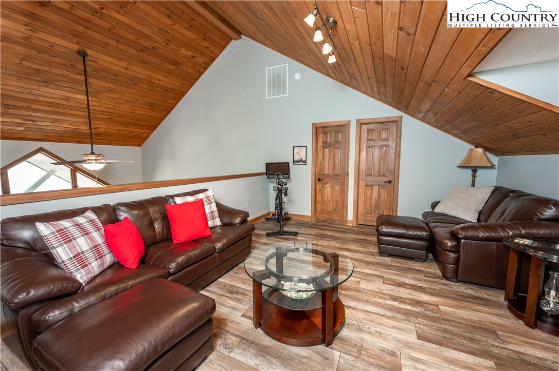 342 Ridgeline Drive, Unit 15B Sugar Mountain, NC 28604 - Photo 18 of 26 a outdoor living space with furniture