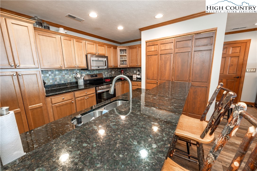 342 Ridgeline Drive, Unit 15B Sugar Mountain, NC 28604 - Photo 24 of 26 a view of a storage and utility room