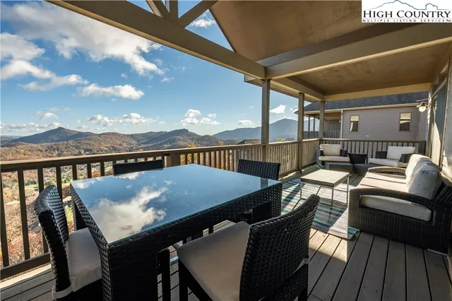 a terrace of a house with outdoor seating
