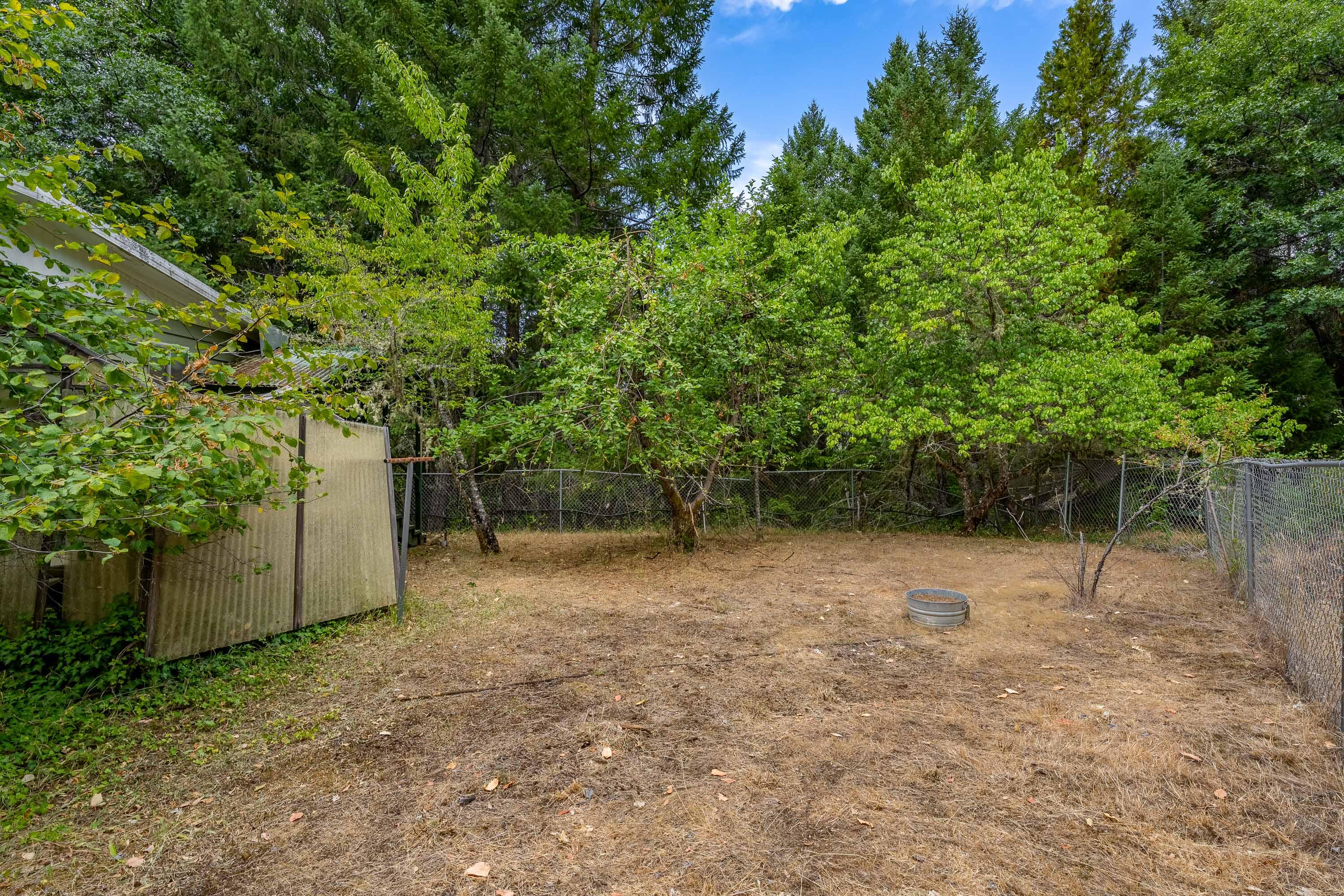 0 Happy Camp Road Cave Junction, OR 97523 - Photo 31 of 48 Mobile Home Backyard