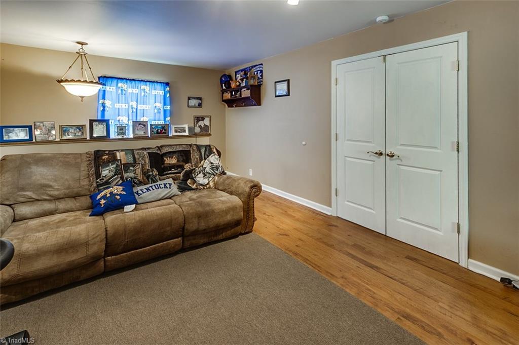 3889 Cresent Avenue Trinity, NC 27370 - Photo 11 of 25 Bonus Room with laminate flooring