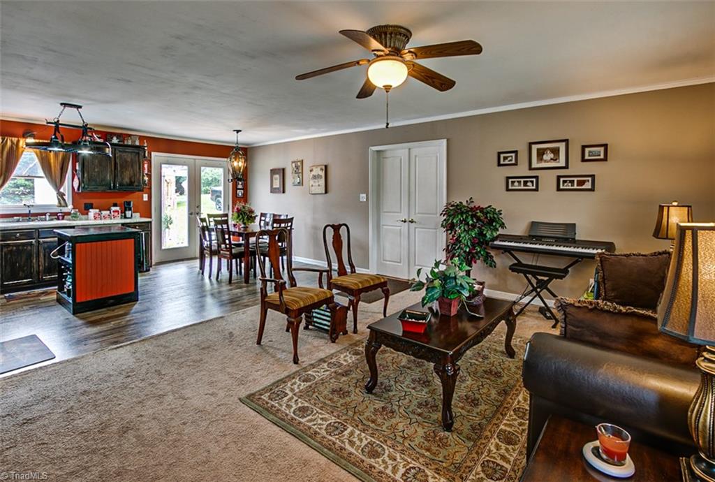 3889 Cresent Avenue Trinity, NC 27370 - Photo 3 of 25 Living room, open to kitchen & dinette area