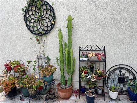 9 Nutcracker Lane Aliso Viejo, CA 92656 - Photo 14 of 15 a table with a vase of flowers on it