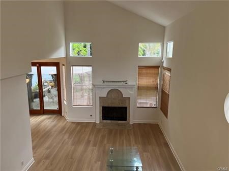 9 Nutcracker Lane Aliso Viejo, CA 92656 - Photo 2 of 15 a living room with furniture and a fireplace