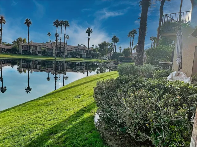 a view of a lake with a sitting area