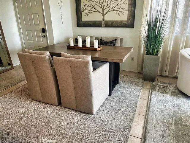 a room with furniture and wooden floor