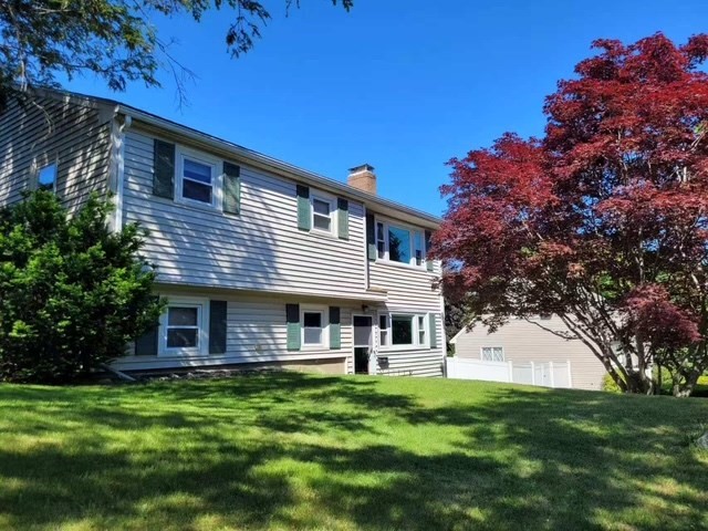 170 Ravenswood Road Waltham, MA 02453 - Photo 17 of 17 a front view of a house with a garden