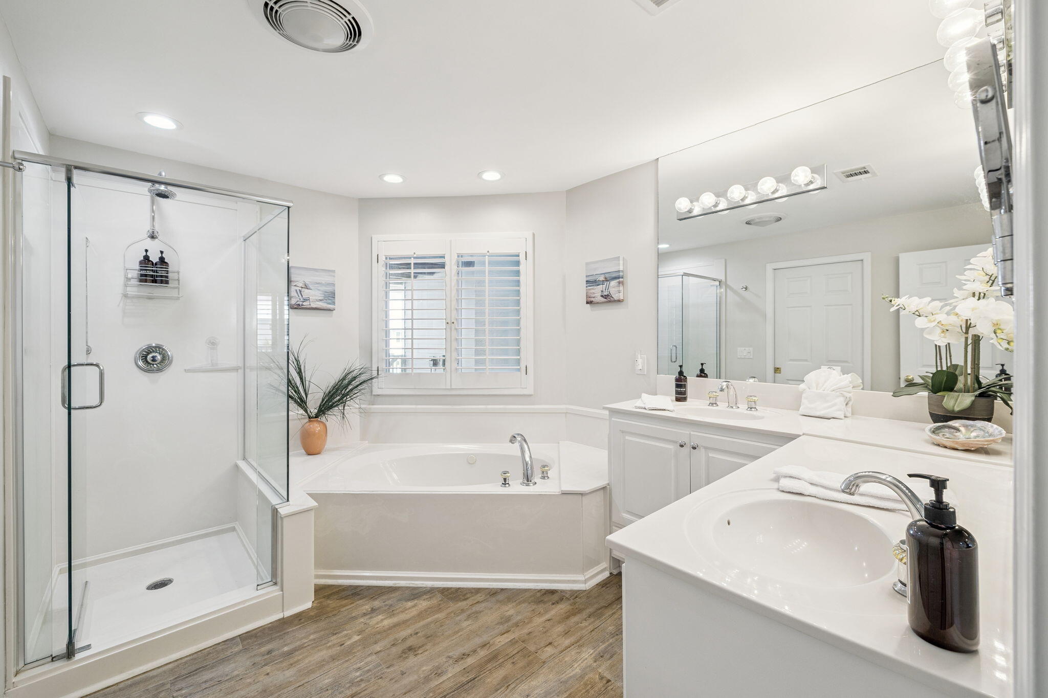 142 Beachside Drive, Unit 10 Santa Rosa Beach, FL 32459 - Photo 22 of 42 a bathroom with a tub a sink shower and mirror