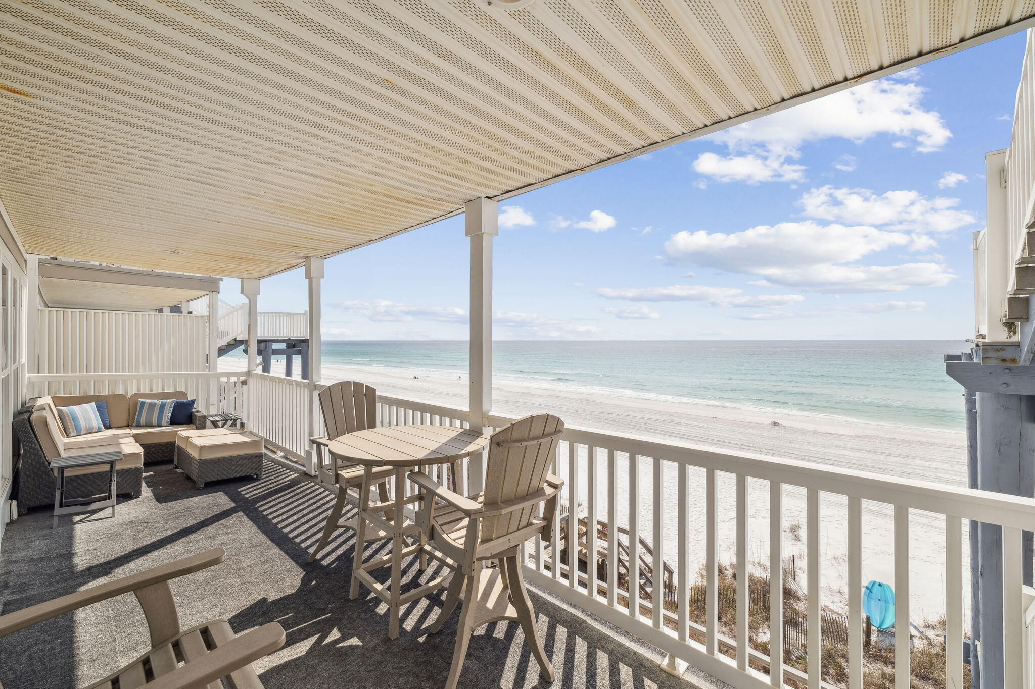 142 Beachside Drive, Unit 10 Santa Rosa Beach, FL 32459 - Photo 3 of 42 a balcony with furniture and a view of living room