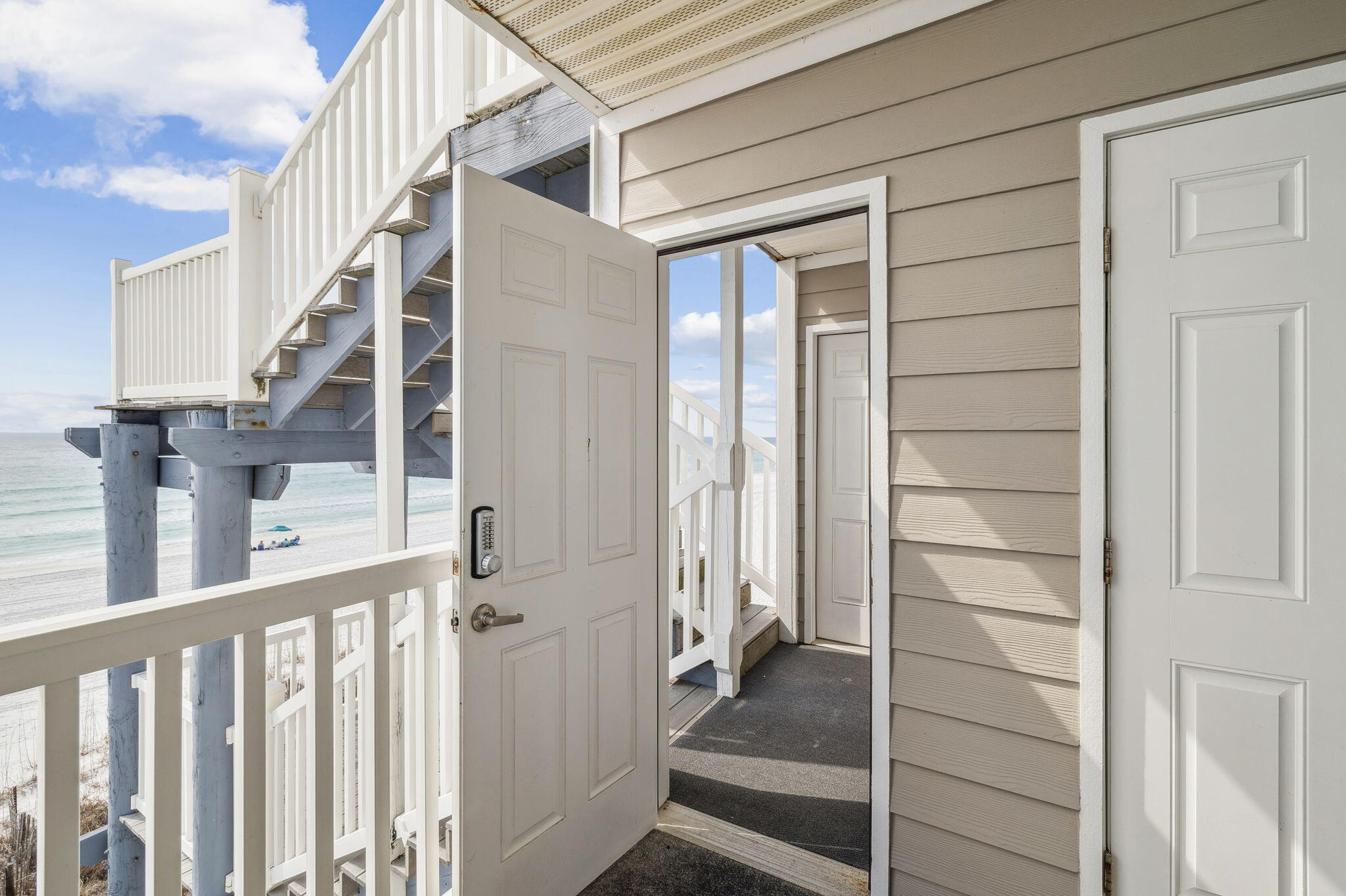 142 Beachside Drive, Unit 10 Santa Rosa Beach, FL 32459 - Photo 33 of 42 a view of entryway with staircase