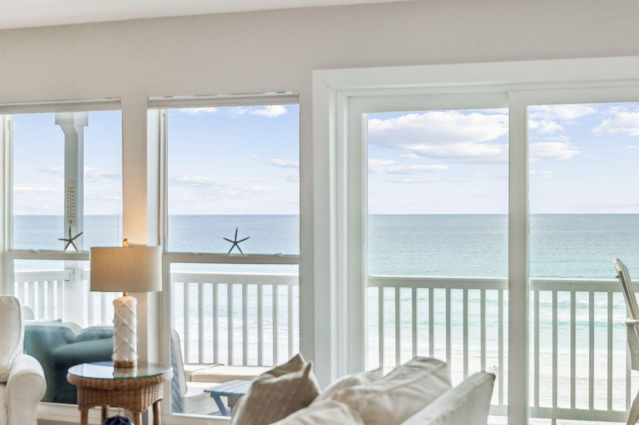 142 Beachside Drive, Unit 10 Santa Rosa Beach, FL 32459 - Photo 5 of 42 a living room with furniture and a large window