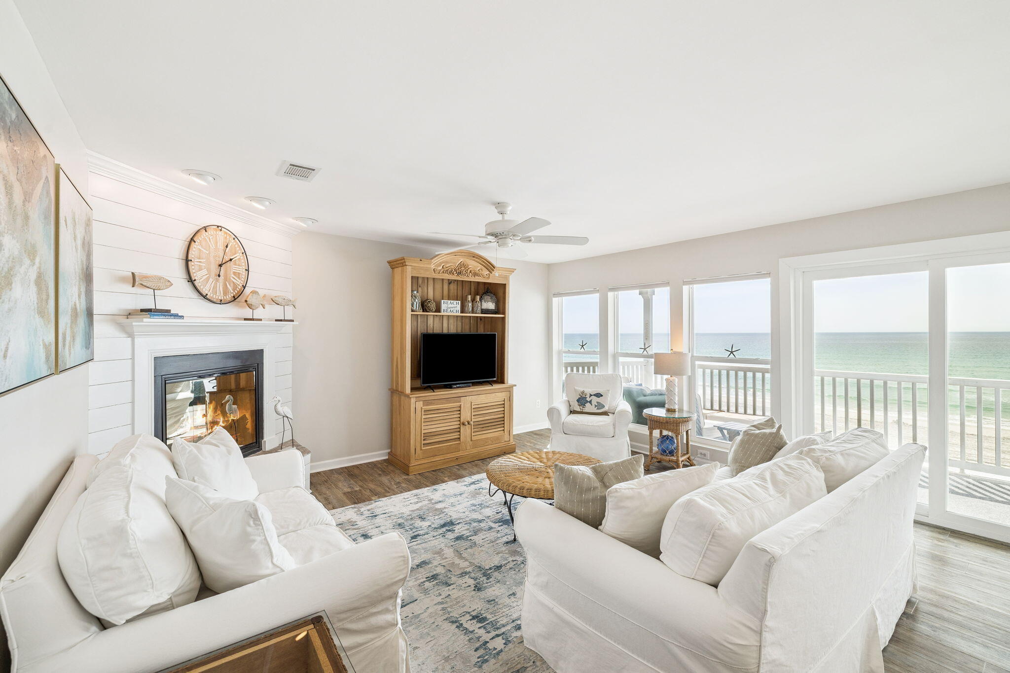 142 Beachside Drive, Unit 10 Santa Rosa Beach, FL 32459 - Photo 6 of 42 a living room with furniture a fireplace and a large window