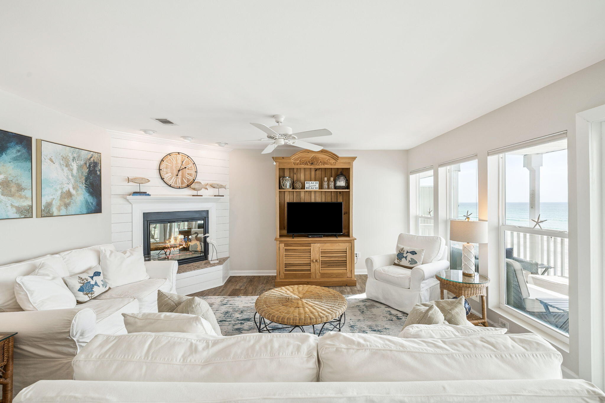 142 Beachside Drive, Unit 10 Santa Rosa Beach, FL 32459 - Photo 7 of 42 a living room with furniture and a flat screen tv