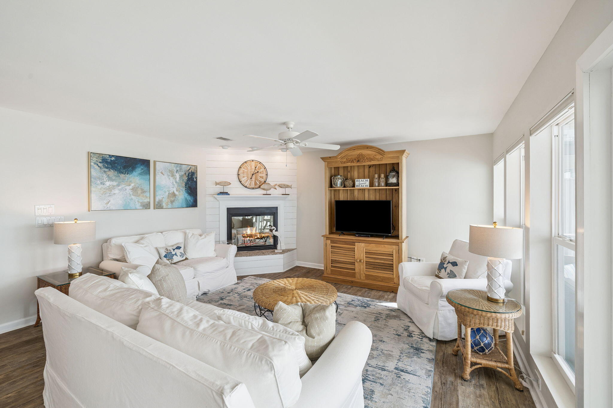 142 Beachside Drive, Unit 10 Santa Rosa Beach, FL 32459 - Photo 9 of 42 a living room with furniture and a fireplace