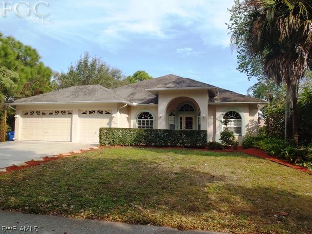 17549 Allentown Road Fort Myers, FL 33967 - Photo 1 of 14 a front view of a house with garden