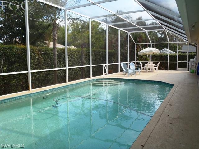 17549 Allentown Road Fort Myers, FL 33967 - Photo 3 of 14 a view of a swimming pool with potted plants