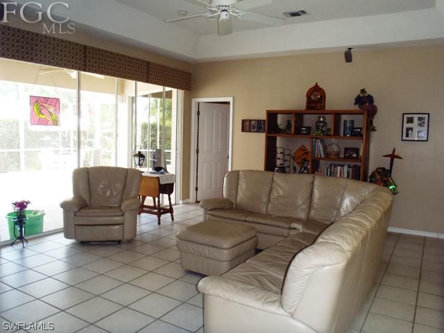 17549 Allentown Road Fort Myers, FL 33967 - Photo 5 of 14 a living room with furniture and a large window
