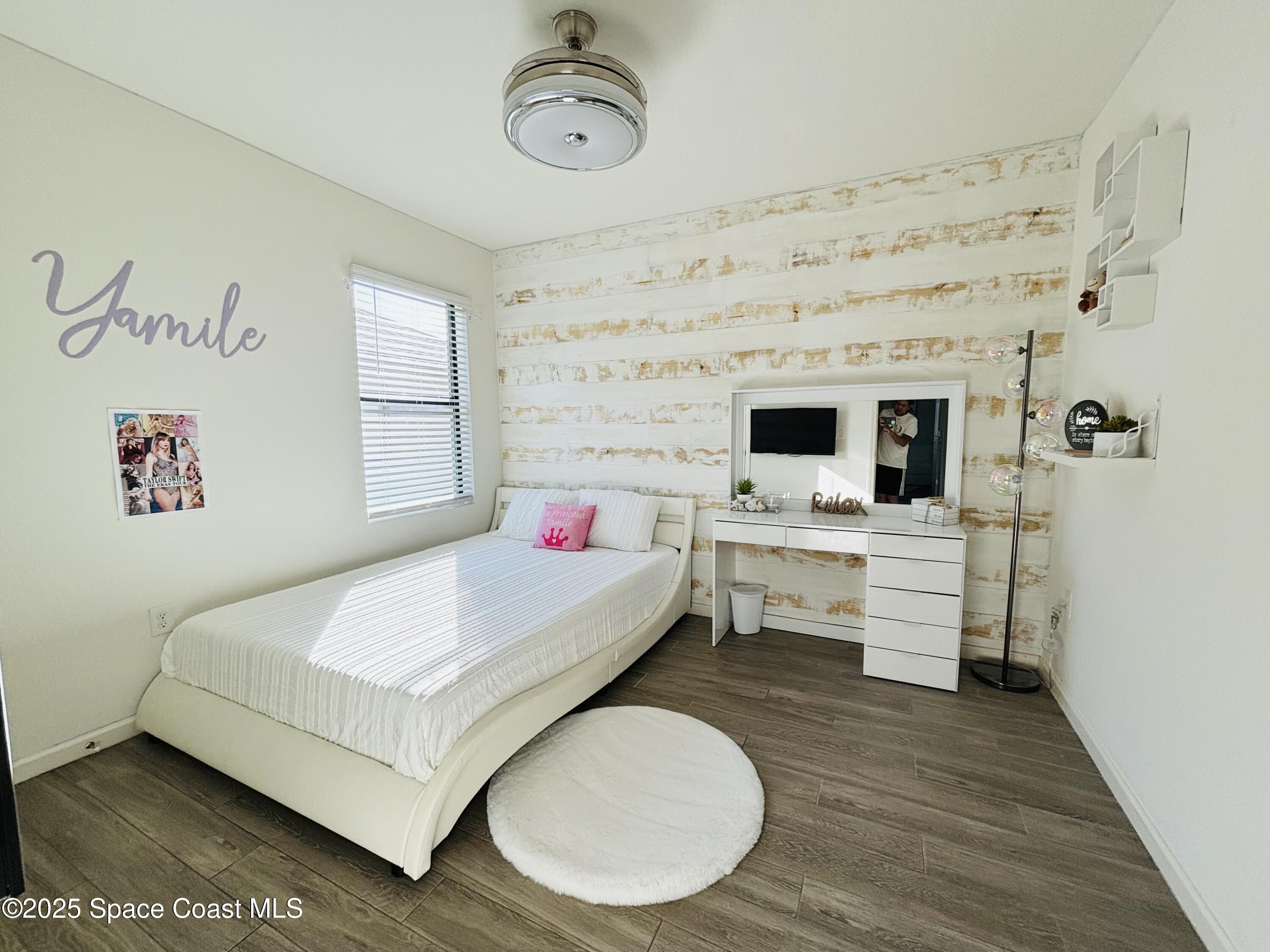 841 Old Country Rd S East Palm Bay, FL 32909 - Photo 5 of 16 a very nice looking room with a big bed