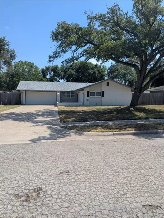 a house view with a outdoor space