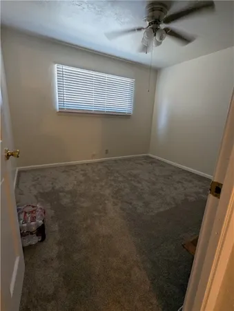 en empty room with windows