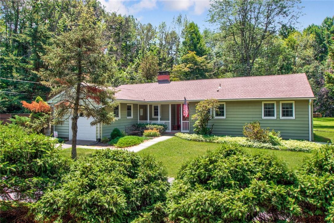 250 Spackenkill Road Poughkeepsie, NY 12603 - Photo 1 of 1 a front view of a house with garden