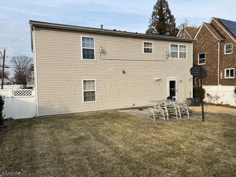 415 Wheatsheaf Road Roselle, NJ 07203 - Photo 29 of 30 a view of a house with patio