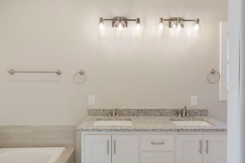 2348 Allen Ferry Road Smithville, TN 37166 - Photo 15 of 23 a bathroom with a granite countertop sink and vanity