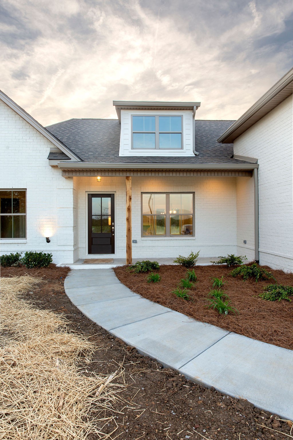 2348 Allen Ferry Road Smithville, TN 37166 - Photo 6 of 23 a front view of a house with a yard and garage