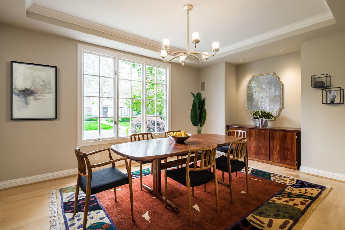 290 Gloria Circle Menlo Park, CA 94025 - Photo 14 of 41 a view of a dining room with furniture window and wooden floor