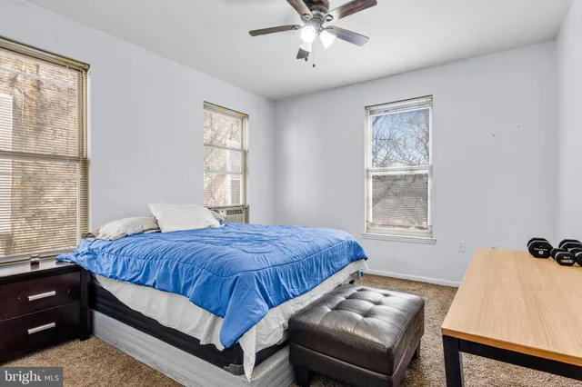a view of a staircase and white walls