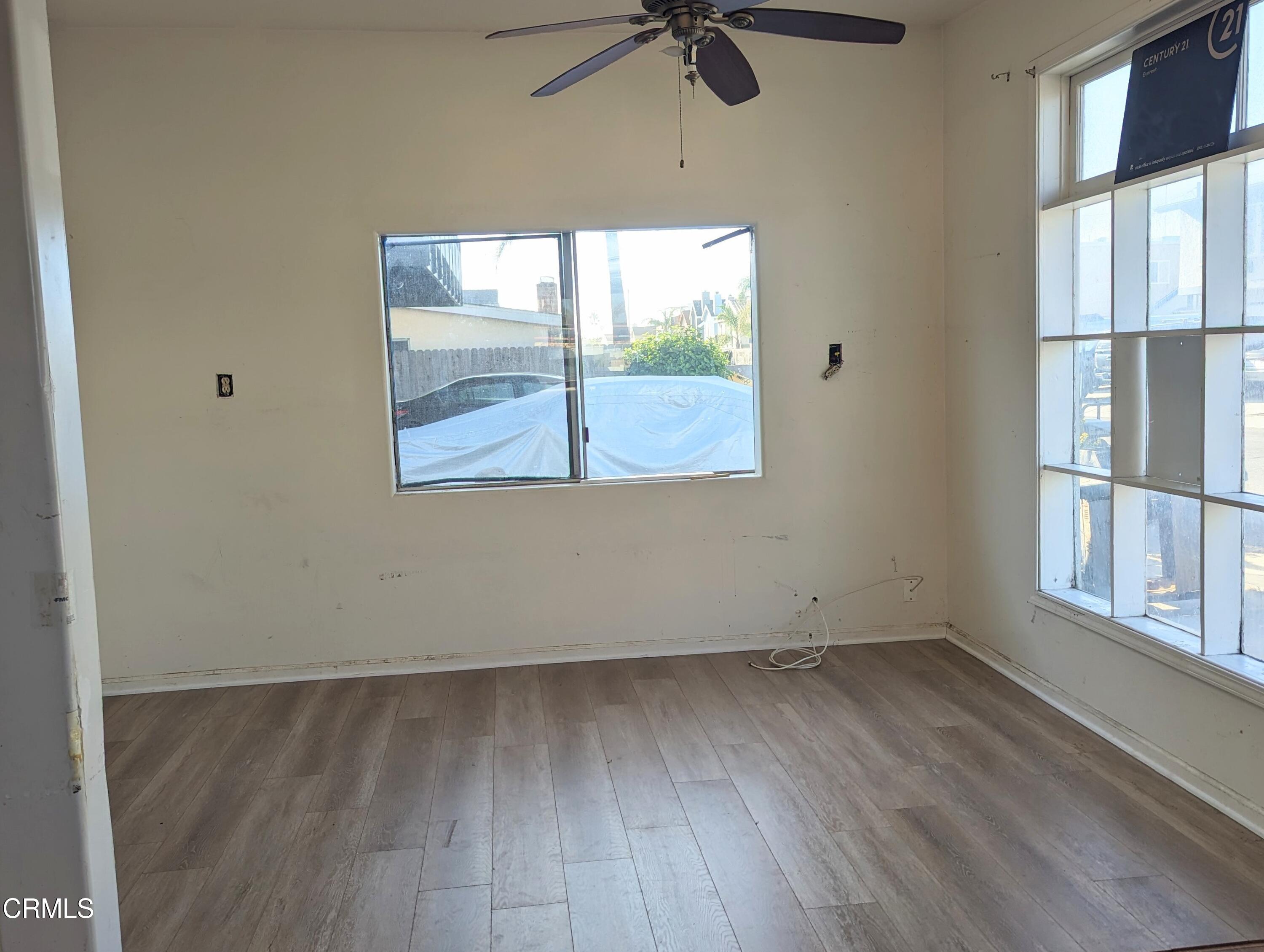 324 Cahuenga Drive Oxnard, CA 93035 - Photo 2 of 17 an empty room with a window